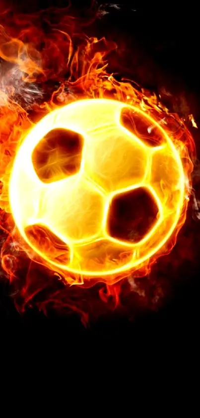 Fiery soccer ball engulfed in flames on a dark background.