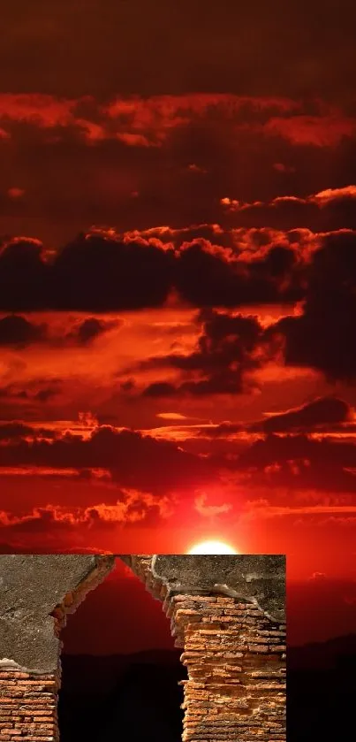 Fiery sunset with a brick ruin in foreground.