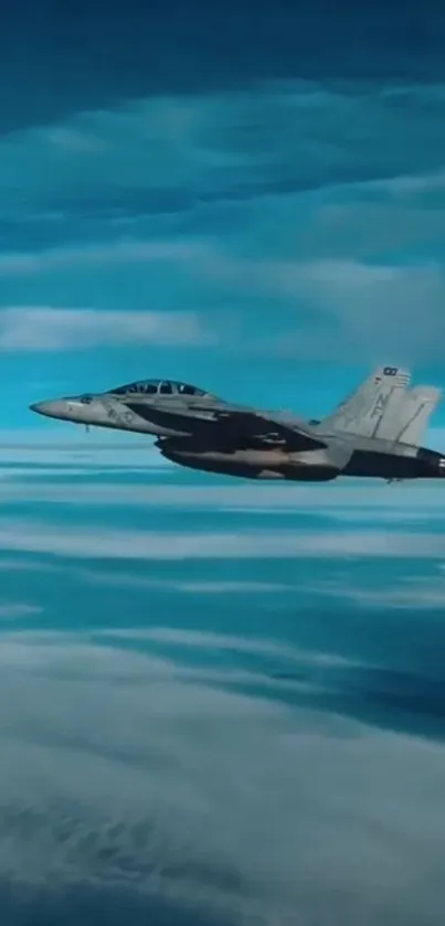 Fighter jet soaring through a vibrant blue sky with clouds.