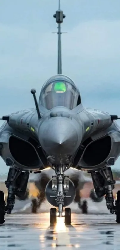 Fighter jet positioned on a wet runway, captured in high-resolution detail.