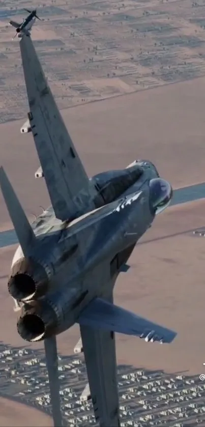 A fighter jet soaring over a desert landscape.