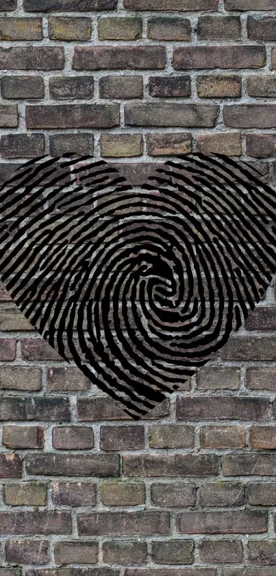 Heart-shaped fingerprint on a brick wall.