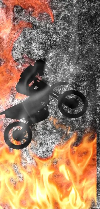 Biker silhouette jumping through flames in dynamic phone wallpaper.