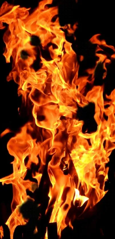 Vibrant orange flaming fire wallpaper with a dark background.