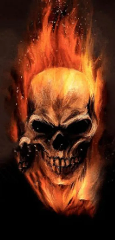 Fiery skull engulfed in vibrant orange flames on a dark background.