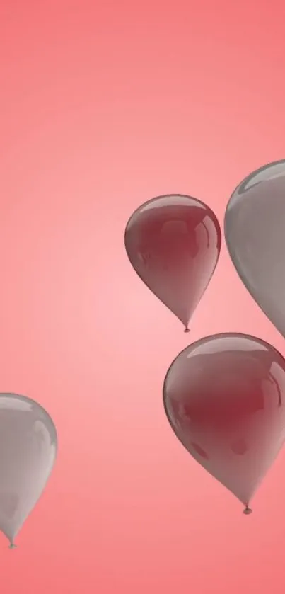 Floating grey and red balloons on a pink background.