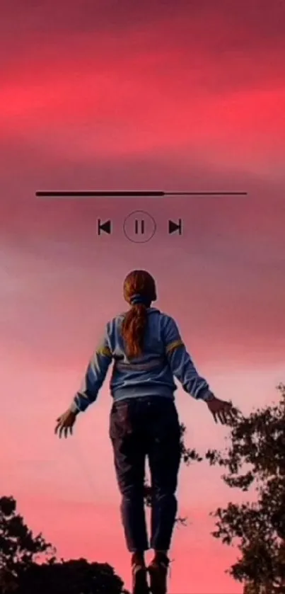 Person floating in a pink sunset sky with play controls.