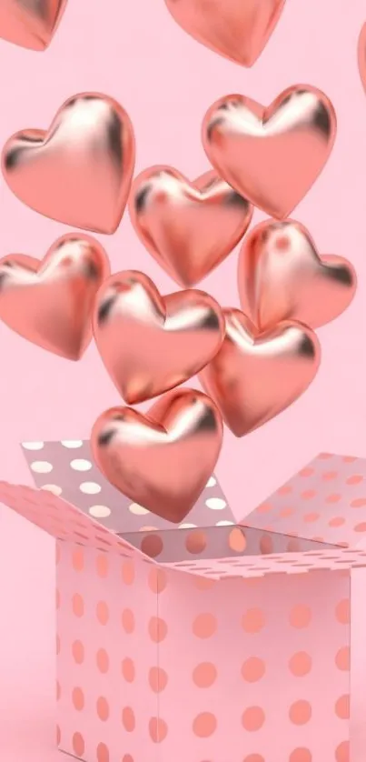 Pink wallpaper with rose gold hearts floating from a dot-patterned gift box.