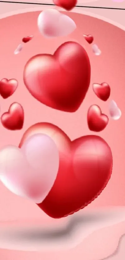 Floating red and pink hearts on a pink background wallpaper.