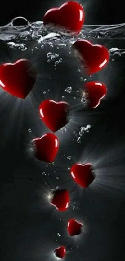 Wallpaper with floating red hearts on a dark background.