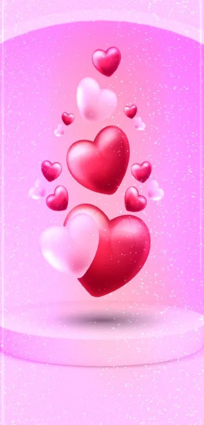 Romantic wallpaper with floating pink and red hearts on a soft pink background.