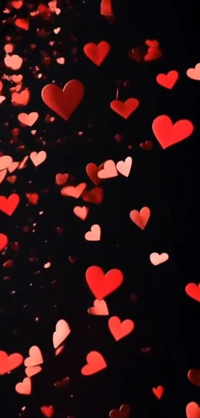 Floating red hearts on a black background, perfect for a romantic touch.