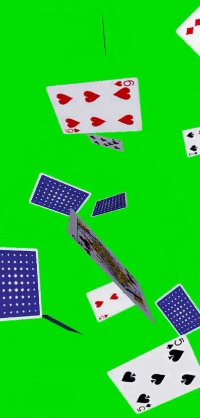 Floating playing cards on a bright green background, vibrant and dynamic.