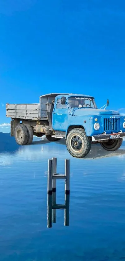 Vintage blue truck floating over a serene lake.