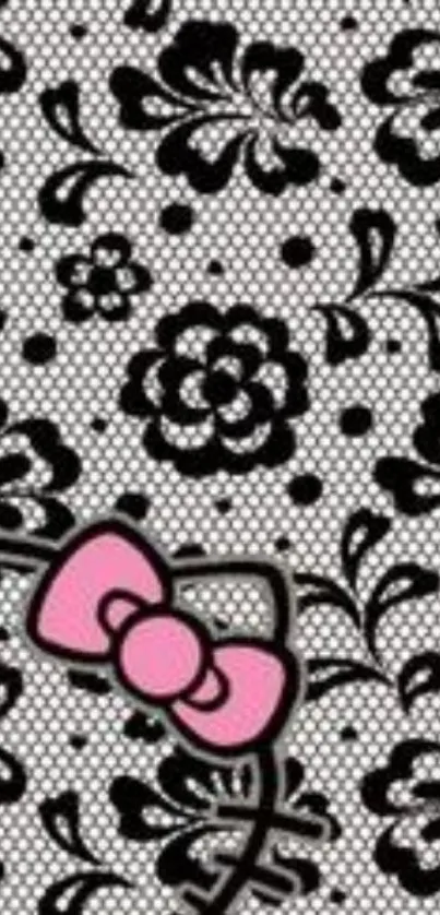 Black floral wallpaper with pink bow design.