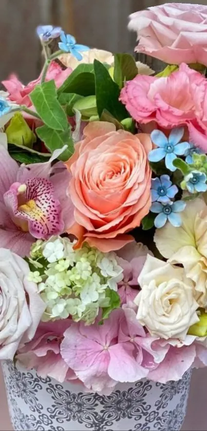 A vibrant bouquet of colorful flowers in soft pink, peach, and cream hues.