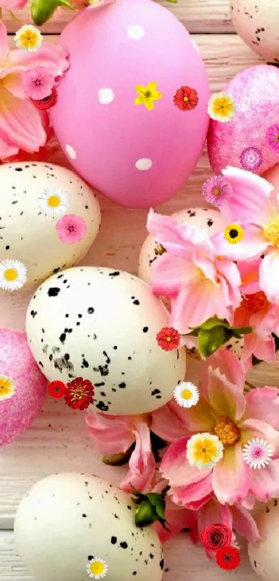 Pink and white Easter eggs with flowers on a wooden background.