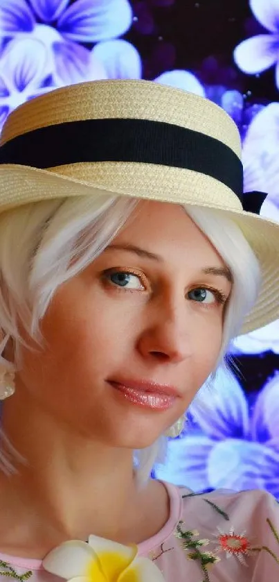 Stylish woman in hat with vibrant purple floral backdrop.