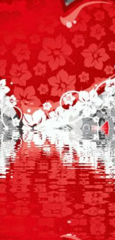 Vibrant floral heart reflected on water, with bold red and white hues.