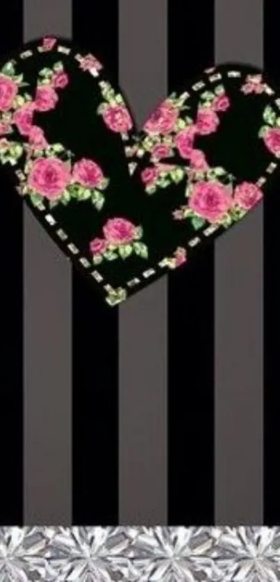 Mobile wallpaper with floral heart on black stripes.