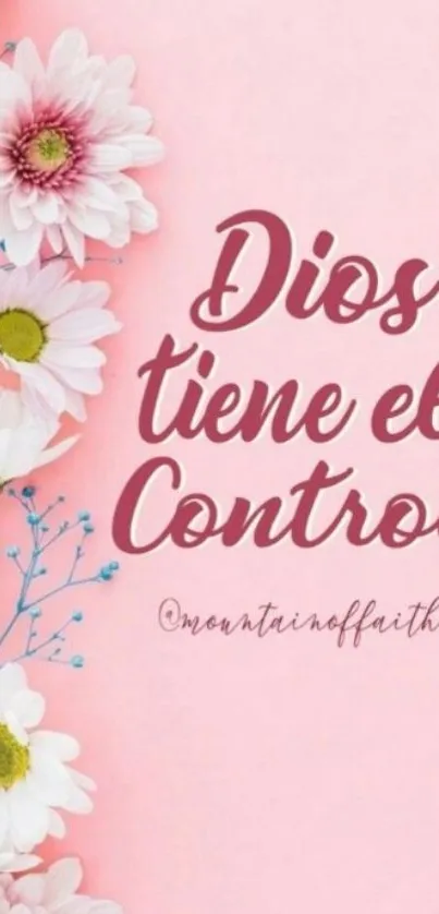 Pink floral wallpaper with inspiring Spanish quote.