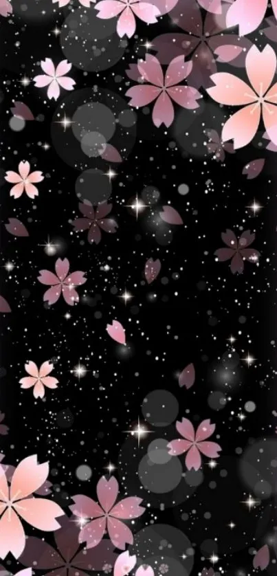 Pink blossoms on a starry black wallpaper.