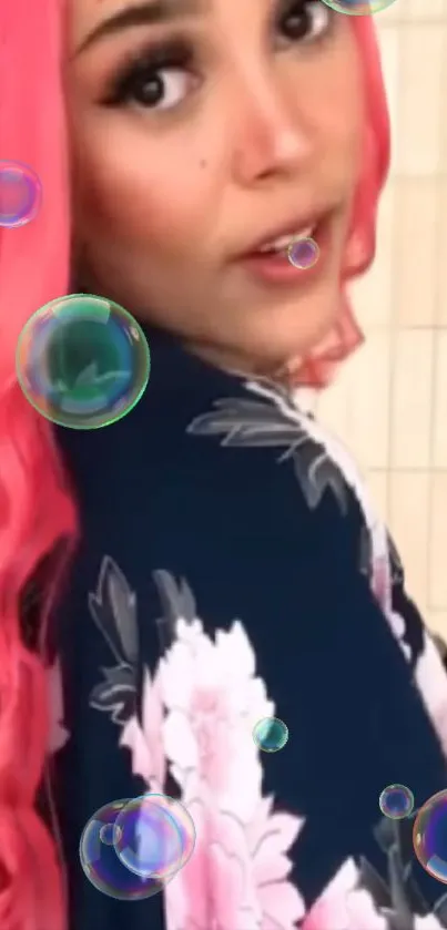 A person with pink hair and bubbles on floral background.