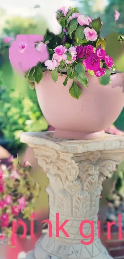 Pink flowers in a garden vase with elegant stone pedestal.