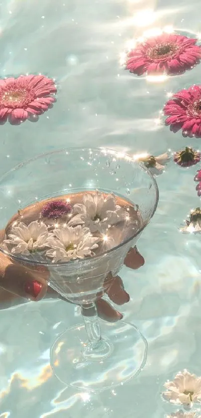 Pink daisies and floating flowers in a serene pool setting.