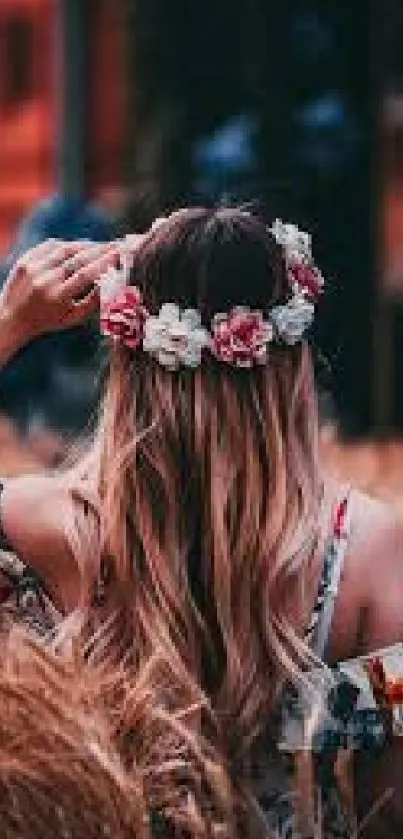 Woman in wheat field wearing a floral crown, embodying tranquility.