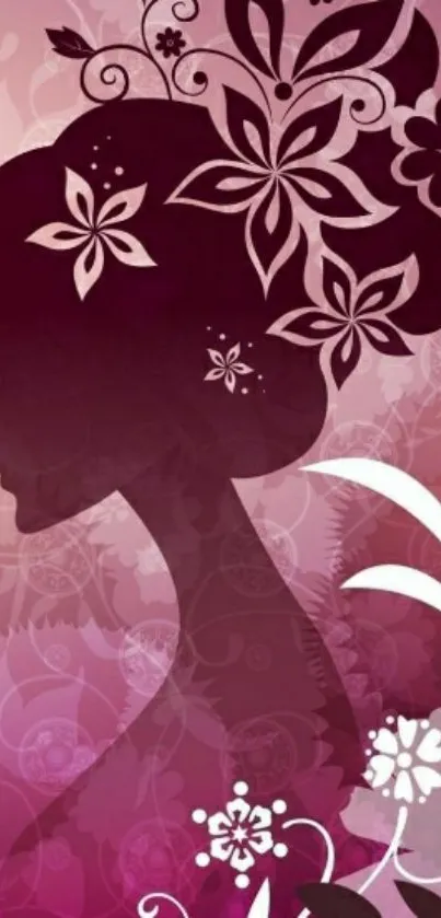 Artistic floral silhouette on purple and pink wallpaper.