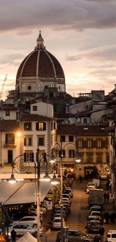 Florence cityscape with cathedral dome at sunset.