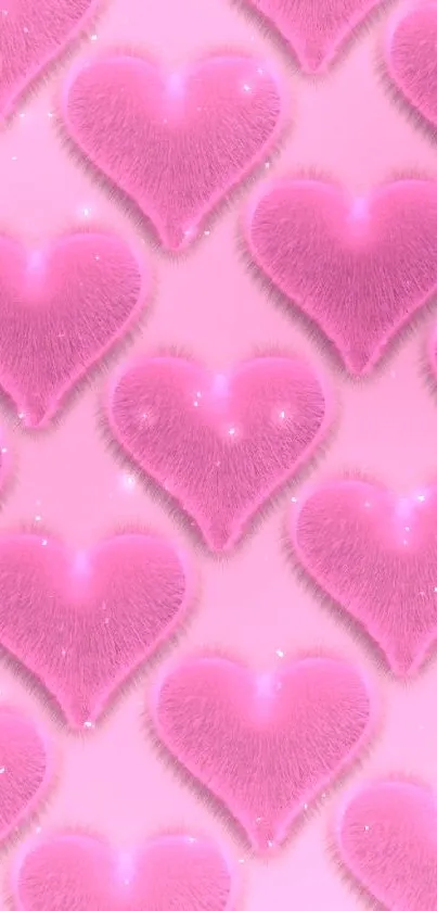 Mobile wallpaper with fluffy pink hearts on light pink background.