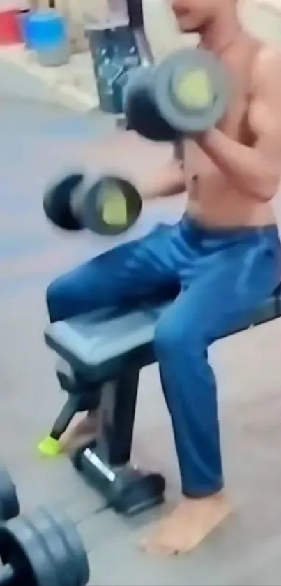 Man lifting weights in a gym, focusing on fitness.