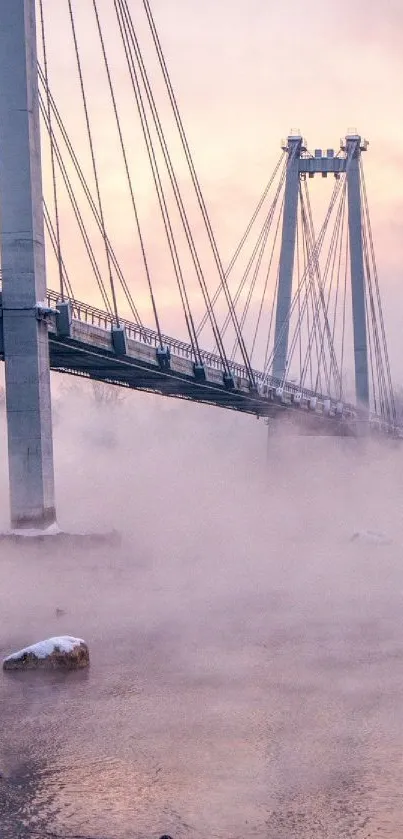 Foggy bridge over calm river with pastel pink mist.