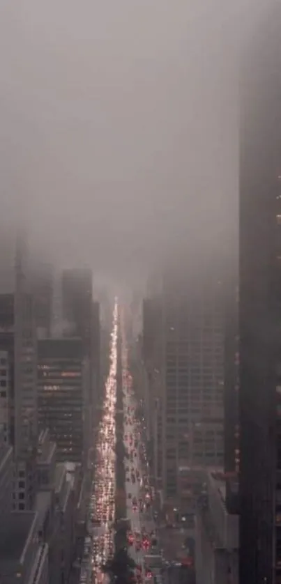 Foggy cityscape with skyscrapers and lights in an urban setting at night.