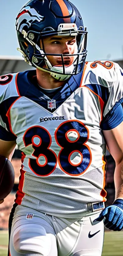 Football player in white and blue uniform on the field during a game.