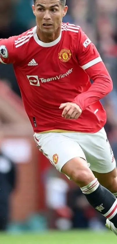 Football player in red jersey running on field