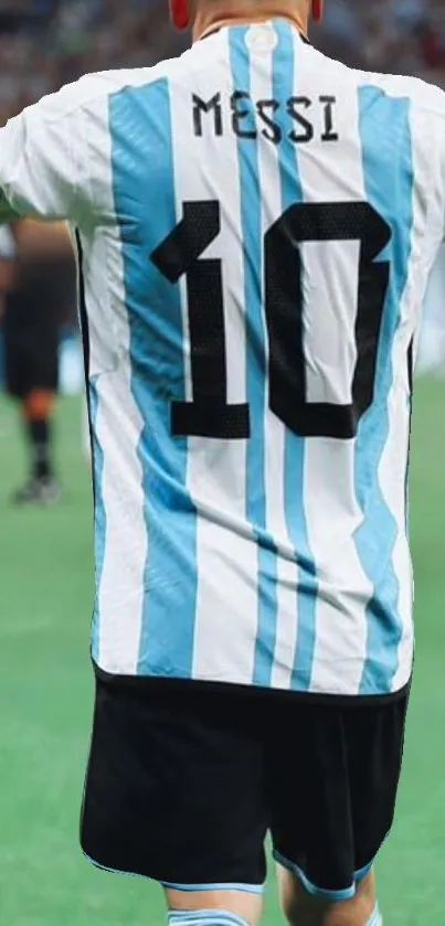 Football player in a blue and white jersey on the field.