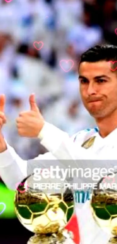 Football star giving thumbs up with trophies in front.