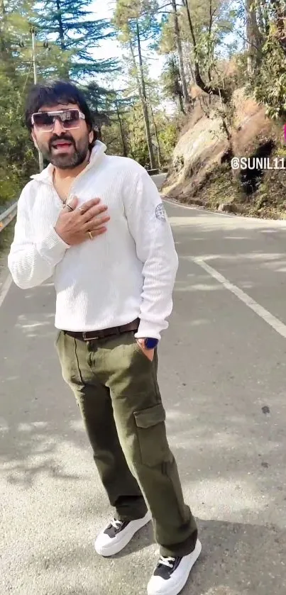 Man strolling down a forest road, embracing nature's serenity.