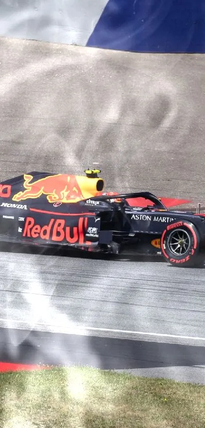 Formula 1 car speeding on a race track with vibrant red accents.