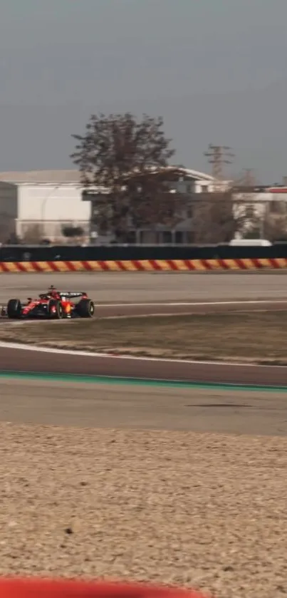 Formula One car on a racing circuit with dynamic motion.