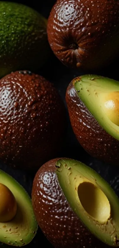 A selection of fresh, ripe avocados in various shades and textures.