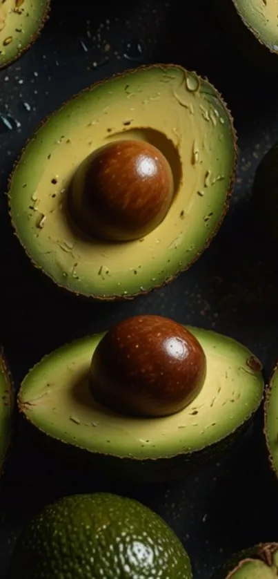 Close-up of sliced avocado halves with water droplets.