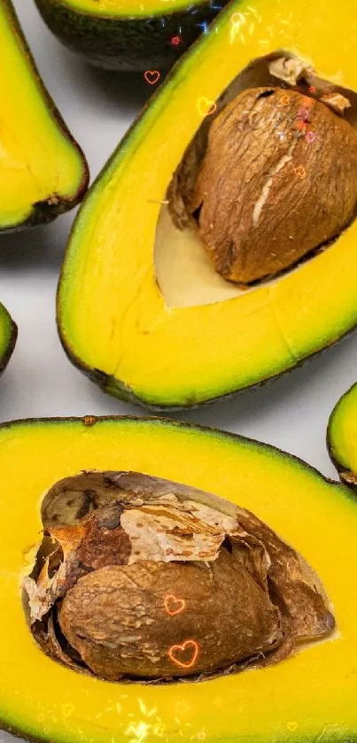 Freshly sliced avocados displayed as a colorful, vibrant wallpaper backdrop.