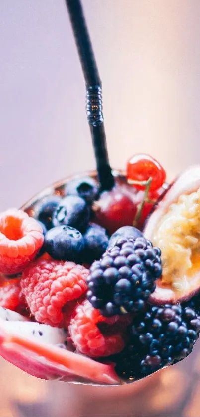 Vibrant assorted berries in a glass.