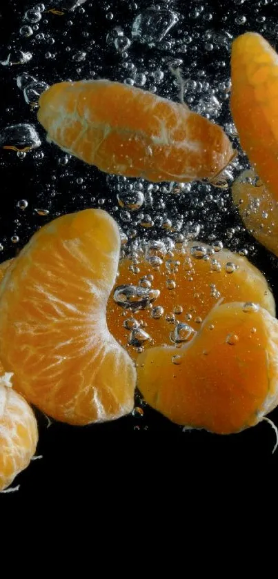 Orange citrus slices floating underwater against a dark background.