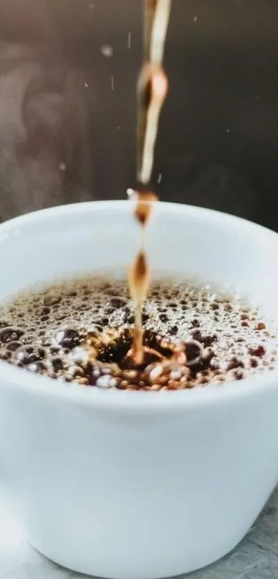 Steaming coffee poured into a white mug with rising steam.