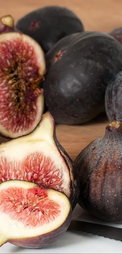 Ripe figs on a wooden board showcasing rich textures and colors.